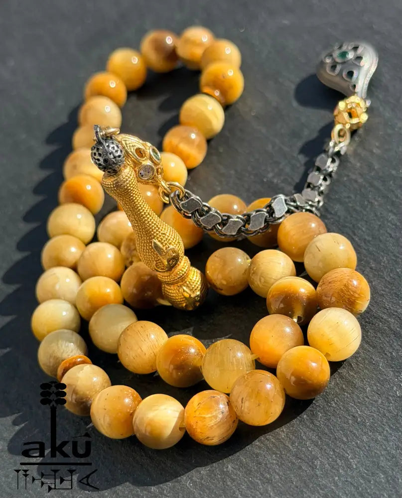 Natuerlicher goldene Katzeauge Stein Tasbih, islamische Misbaha, 925er Silber vergoldete Quaste