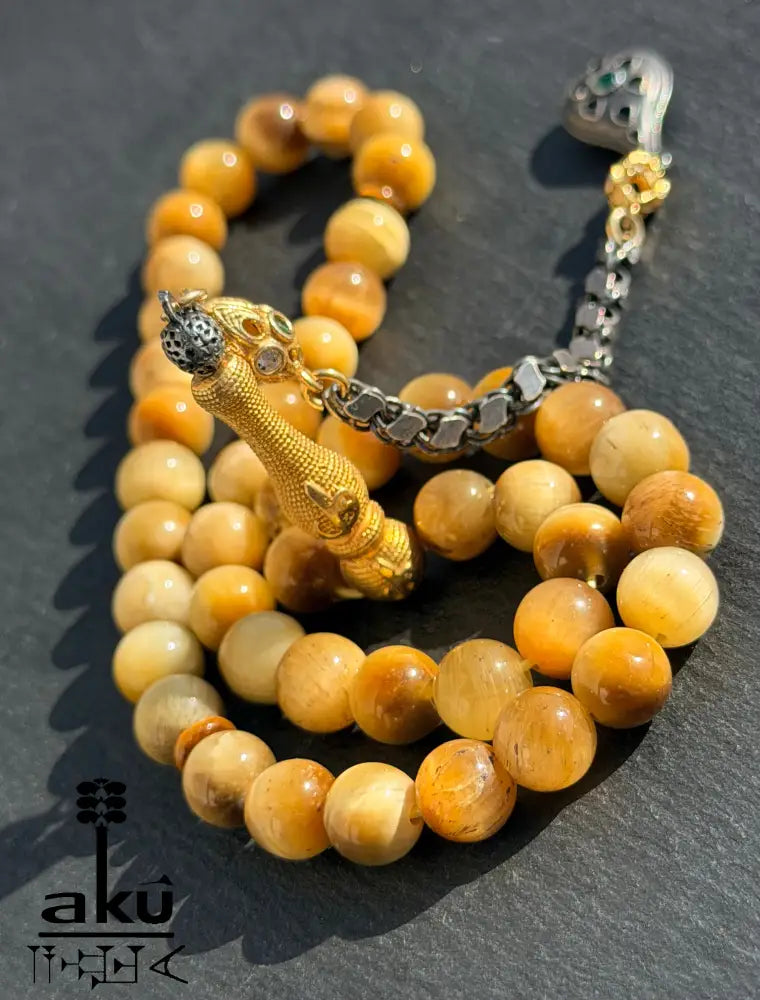 Natuerlicher goldene Katzeauge Stein Tasbih, islamische Misbaha, 925er Silber vergoldete Quaste