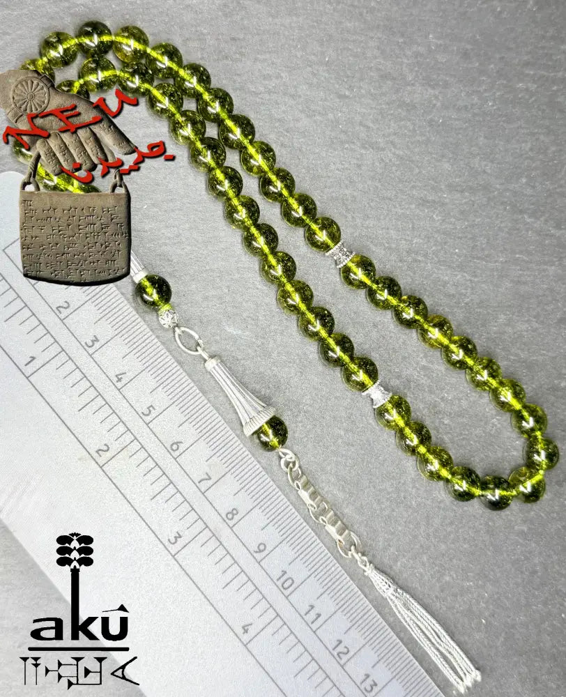 Natürlicher Peridot Tasbih, Edelstein, islamische Misbaha, Herz chakra, 925 Sterling Silbere Quaste, neben einem Lineal