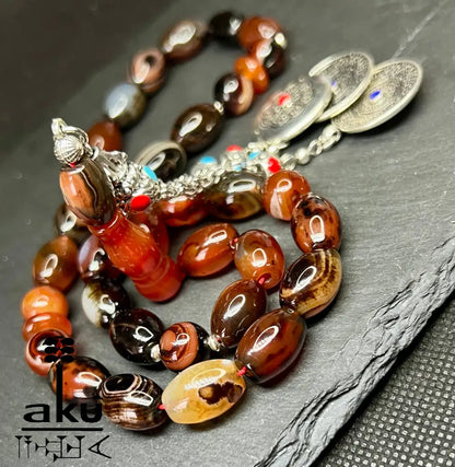 Gebetskette aus rotem Jemen-Achat mit 925 Silber und traditioneller Quaste – handgefertigte Qualität aus Deutschland.